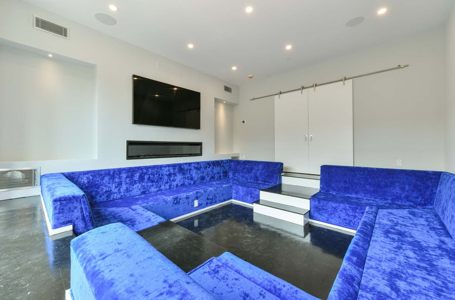 living room with blue couches